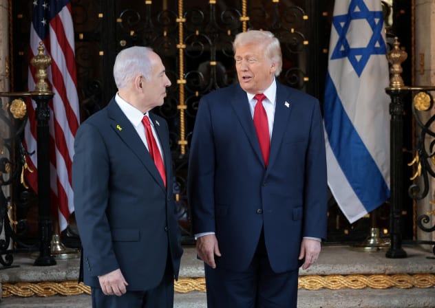 US President Donald Trump speaks with Prime Minister Benjamin Netanyahu upon arrival for meetings at Trump's Mar-a-Lago club in Palm Beach, Florida, December 29, 2025.