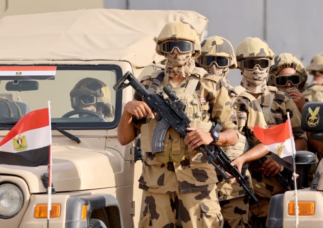 Military personnel stand guard on the day of Egyptian Prime Minister Mostafa Madbouly's visit to the Rafah border crossing between Egypt and the Gaza Strip, amid the ongoing conflict between Israel and Palestinian Islamist group Hamas, in Rafah, Egypt, October 31, 2023.
