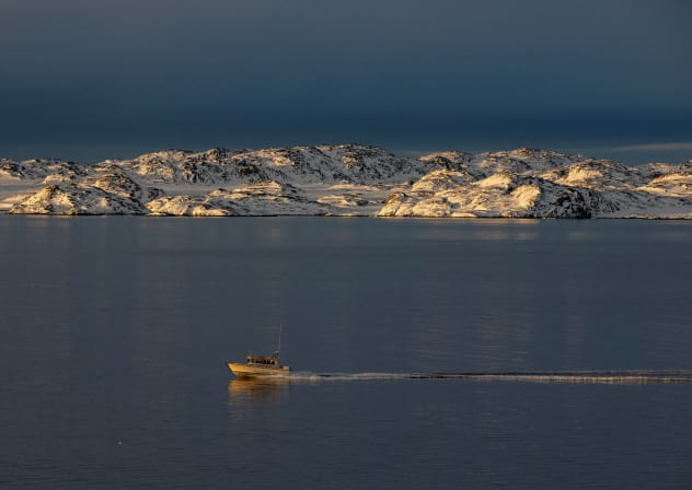 A ship sails on the day of the meeting between top US officials and the foreign ministers of Denmark and Greenland, in Nuuk, Greenland, January 14, 2026.