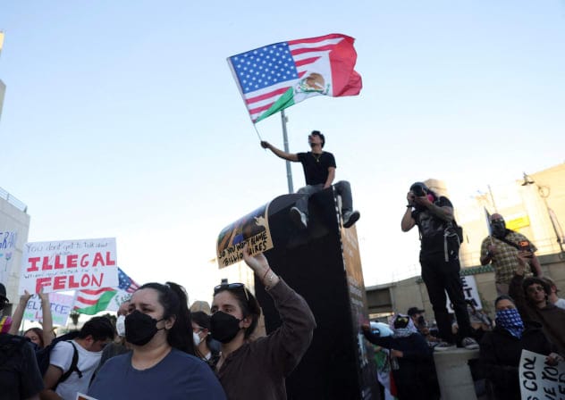 People protest against U.S. Immigration and Customs Enforcement (ICE) and U.S. President Donald Trump's immigration policies outside the Metropolitan Detention Center (MDC) in Los Angeles, California, U.S., January 30, 2026. 
