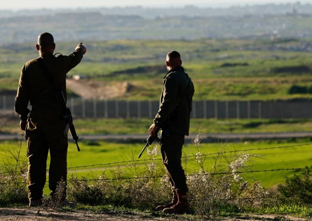 IDF soldiers standing near the Gaza border, in Israel, February 4, 2026