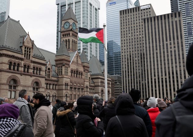People gather in support of Palestinians as the Palestinian flag flies at Toronto’s City Hall, after Canada officially recognised the Palestinian state in September, in Toronto, Ontario Canada, November 17, 2025.