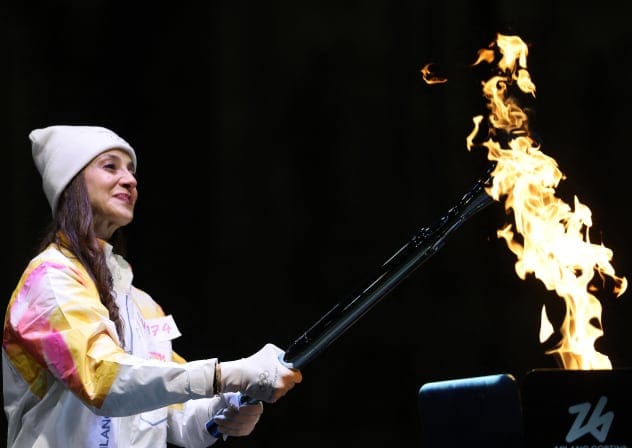 Ballet dancer Nicoletta Manni lights the 2026 Olympic Torch in Milan, February 6, 2026.