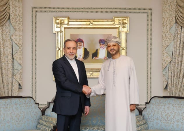 Iranian Foreign Minister Abbas Araghchi (L) meets with Omani Foreign Minister Badr bin Hamad al-Busaidi for indirect nuclear talks with the US in Muscat, Oman, February 6, 2026.