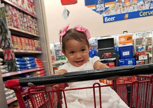 18-month-old Amalia, who, according to a lawsuit filed, suffered a life-threatening respiratory illness while in US Immigration and Customs Enforcement (ICE) custody, reacts, in this handout picture obtained on February 7, 2026