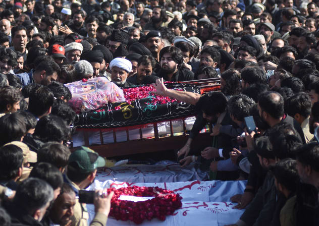 People gather to attend a funeral for victims following the suicide explosion at a Shi'ite Muslim mosque, in Islamabad, Pakistan, February 7, 2026. 