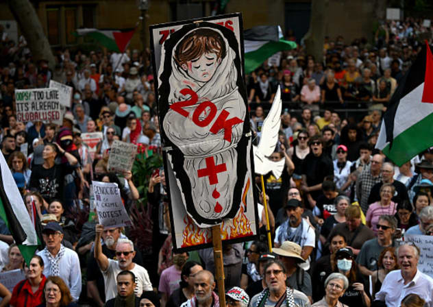 Pro-Palestinian protesters take part in a demonstration against Israeli President Isaac Herzog's visit to Australia in Sydney on February 9, 2026.