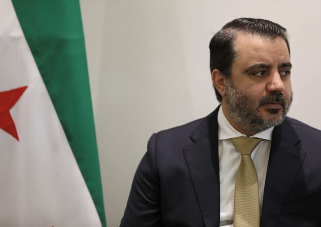 Syrian Foreign Minister Asaad Hassan al-Shibani looks on during a meeting with Jordanian Foreign Minister Ayman Safadi in Amman, Jordan August 12, 2025.