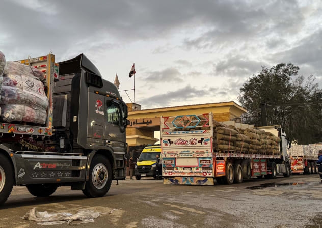 Humanitarian aid trucks enter through the Egyptian side of the Rafah border crossing with the Gaza Strip on February 4, 2026.