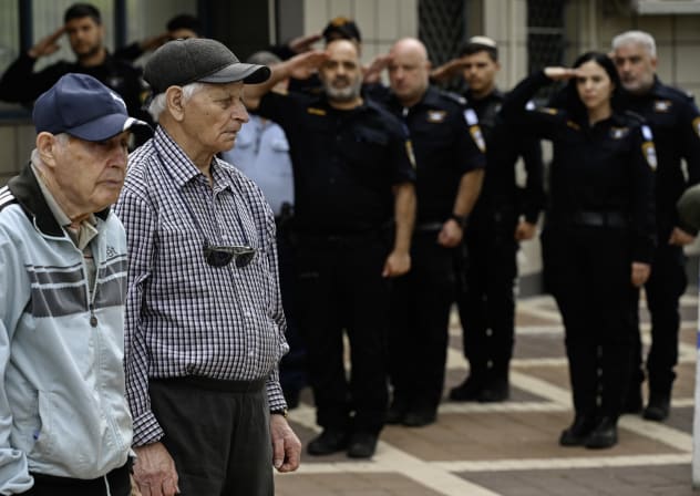 Holocaust survivors and WW2 veterans from the former Soviet Union take part at the Holocaust Memorial service of their local Police station, Katsrin, Golan Heights, April 24, 2025.