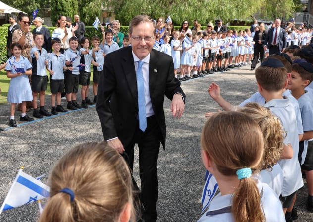 Israeli President Isaac Herzog meets students at Moriah War Memorial College during his state visit following a deadly mass shooting at a Jewish Hanukkah celebration at Bondi Beach on December 14, in Sydney, Australia, February 10, 2026. 