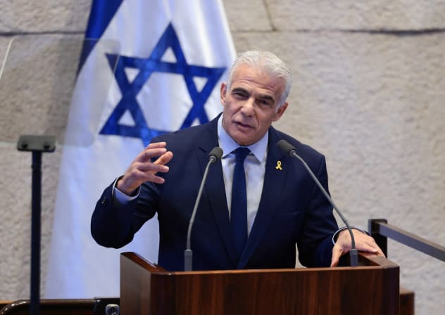 Israeli opposition leader Yair Lapid speaks at the Knesset on the day of US President Donald Trump's address, amid a U.S.-brokered prisoner-hostage swap and ceasefire deal between Israel and Hamas, in Jerusalem, October 13, 2025.