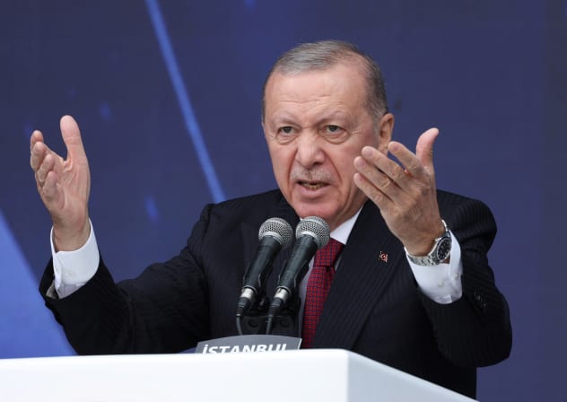 Turkish President Tayyip Erdogan speaks during a ceremony for the handover of new vehicles to the gendarmerie and police forces in Istanbul, Turkey, November 28, 2025.