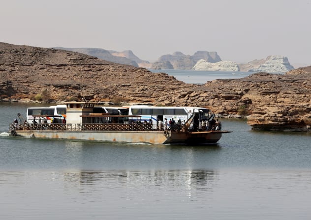 Sudanese and people from other nationalities cross the river Nile in a ferry, after being evacuated from Khartoum to Abu Simbel city, at the upper reaches of the Nile in Aswan, Egypt, April 27, 2023.