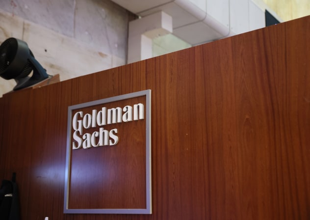 The Goldman Sachs company logo is displayed at the New York Stock Exchange on October 14, 2025 in New York City.