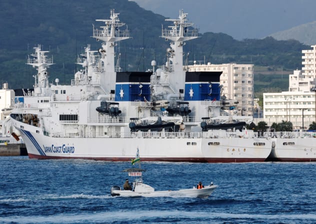 Japan Coast Guard ships are docked at a port in Ishigaki, Okinawa Prefecture, Japan, January 13, 2026.