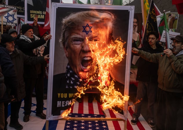 America First should understand that Iran has already launched a war on them decades ago. Iranian pro-regime supporters burn pictures of US President Donald Trump during a rally held outside the US consulate on in Istanbul, Turkey.