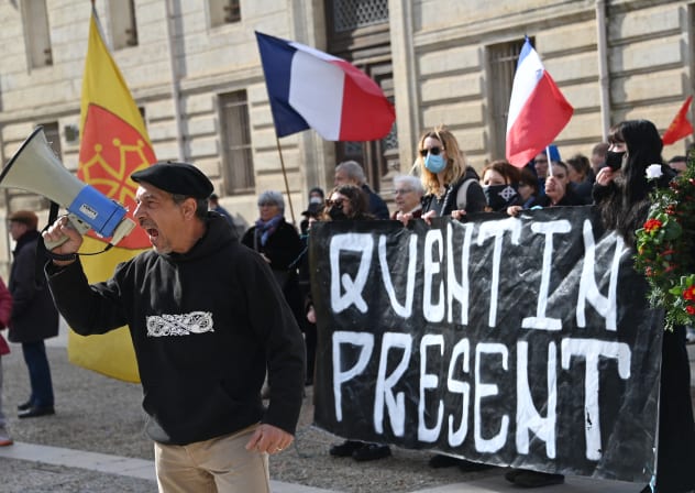 Activist of the far-right identitarian movement 'Ligue du Midi' Olivier Roudier shouts in a megaphone in Montpellier, southern France, on February 15, 2026, during a rally after the fatal beating of a 23-year-old Quentin. 