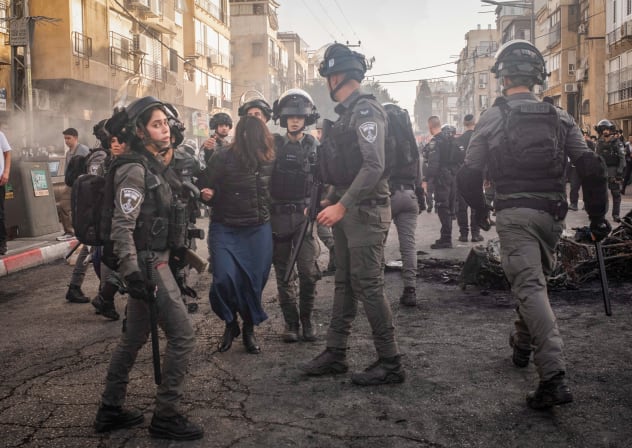 Ultra-Orthodox Jewish men clash with police following an assault on two female Israeli soldiers in Bnei Brak, central Israel, February 15, 2026.