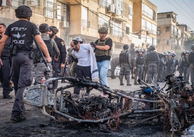 Ultra-Orthodox Jewish men clash with police following an assault on two female Israeli soldiers in Bnei Brak, central Israel, February 15, 2026.