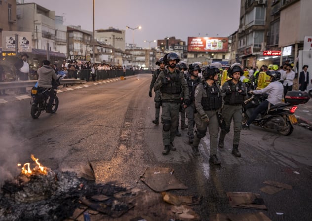Ultra-Orthodox Jewish men clash with police following an assault on two female Israeli soldiers in Bnei Brak, central Israel, February 15, 2026.