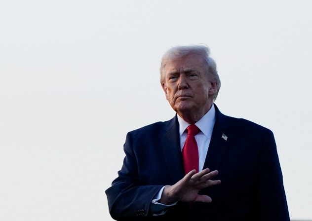 US President Donald Trump gestures as he arrives at Palm Beach International Airport in West Palm Beach, Florida, US, February 13, 2026.