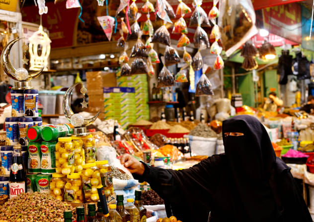 A Palestinian woman shops as she prepares for the holy fasting month of Ramadan, in Gaza City, February 17, 2026. 