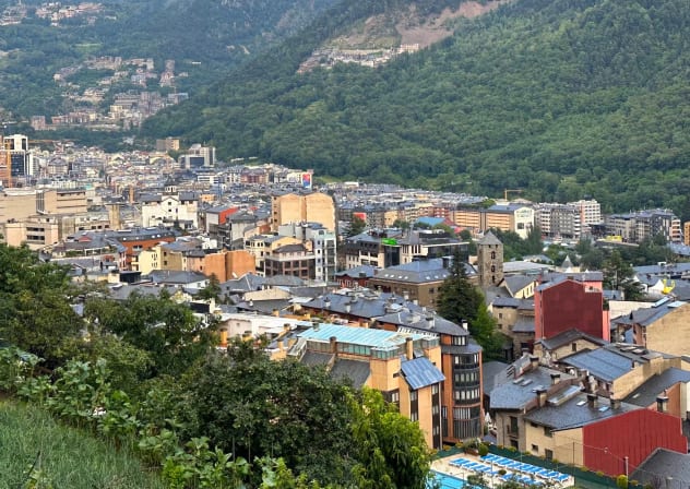 Panoramic view of Andorra La Vella, capital of the Principality of Andorra, from a hiking trail in the Pyrenees.