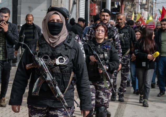 Security for the protest is provided by the local Asayish (Kurdish Police) during a demonstration for Kurdish rights on February 10, 2026 in Qamishli, Syria. The protests called for the protection of Kurdish rights and the achievements of the Rojava revolution as the region