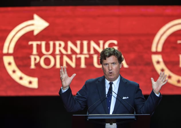 Tucker Carlson speaks during the memorial service for political activist Charlie Kirk at State Farm Stadium on September 21, 2025 in Glendale, Arizona; illustrative.