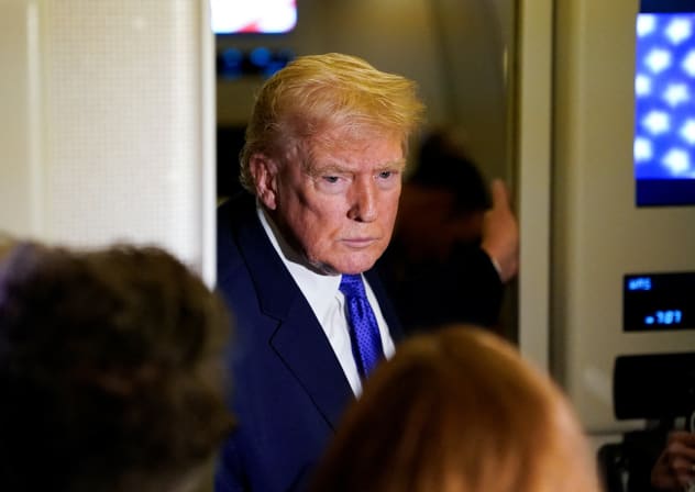 U.S. President Donald Trump speaks to reporters onboard Air Force One, on travel from West Palm Beach, Florida, to Joint Base Andrews, Maryland, US, February 16, 2026.