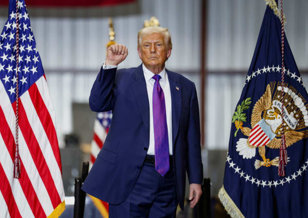 US President Donald Trump makes a fist at the end of an event during a visit to Coosa Steel Corporation, in Rome, Georgia, U.S., February 19, 2026. 