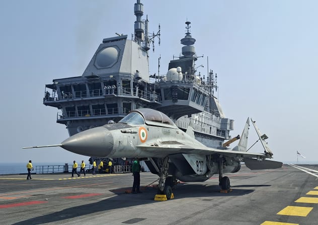 A MiG-29K fighter jet sits on the flight deck of India’s aircraft carrier INS Vikrant during the International Fleet Review (IFR) 2026 off the coast of Visakhapatnam, India.