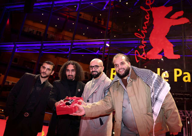 SOFIANE ZERMANI, Abdallah Alkhatib, Taqiyeddine Issaad and Salah Issaad pose with the GWFF Best Feature Film Debut Award for “Chronicles From the Siege” at the 76th Berlinale International Film Festival in Berlin, Germany, February 21, 2026.
