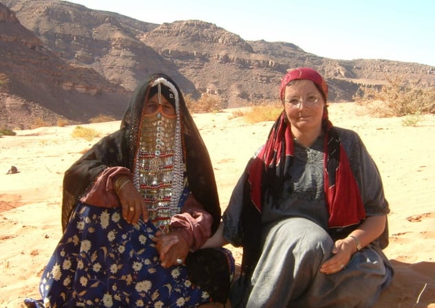 Margaret Malka Rawicz sits with a Bedouin lady who took her to tend sheep in Sinai Desert. 
