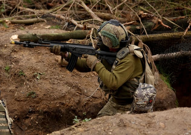 A Ukrainian soldier takes part in a final tactical exercise on the fourth anniversary of Russia's full-scale invasion of Ukraine, held at a British Army training camp in East Anglia, Britain, February 24, 2026.