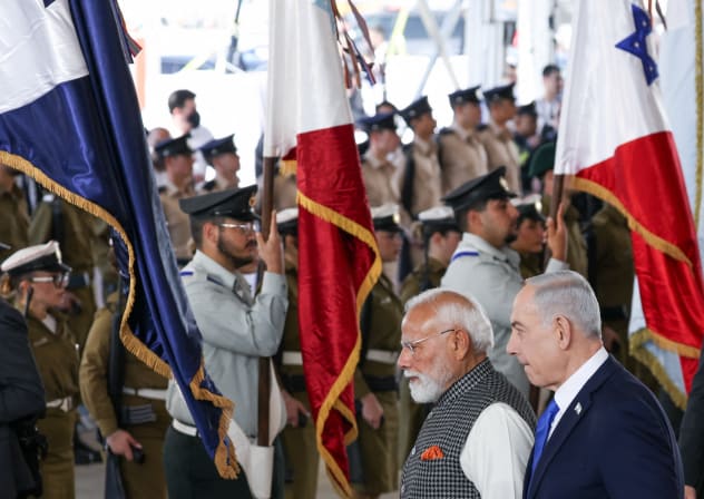 India's Prime Minister Narendra Modi and Israel's Prime Minister Benjamin Netanyahu attend a welcome ceremony upon Modi's arrival at Ben Gurion International Airport in Lod, near Tel Aviv, Israel February 25, 2026.