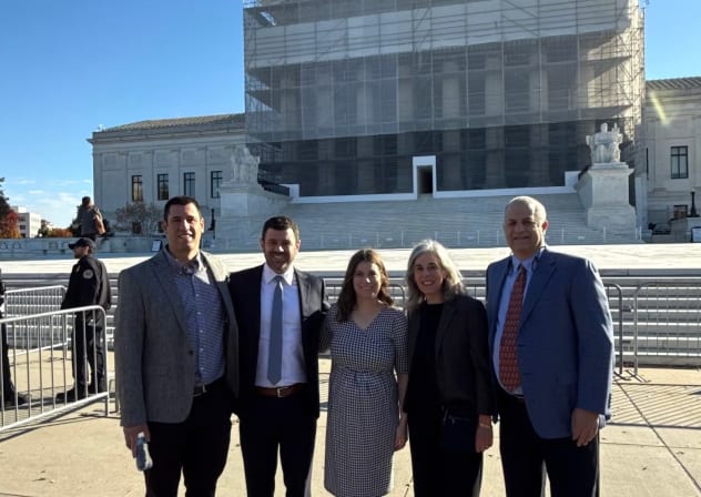 From left, Ben Woldenberg, Stephen Woldenberg, Elana Woldenberg Ruffman, Nadine Woldenberg and Rick Woldenberg pose in front of the Supreme Court building in Washington, DC