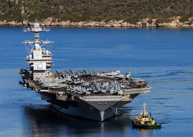 The US Navy aircraft carrier USS Gerald R. Ford departs Souda Bay on the island of Crete on February 26, 2026.