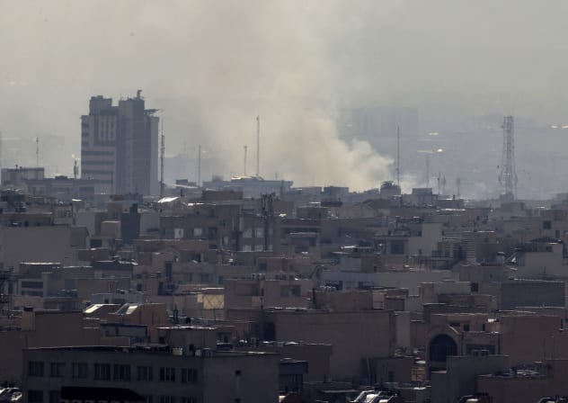 A plume of smoke rises following a reported explosion in Tehran on February 28, 2026.