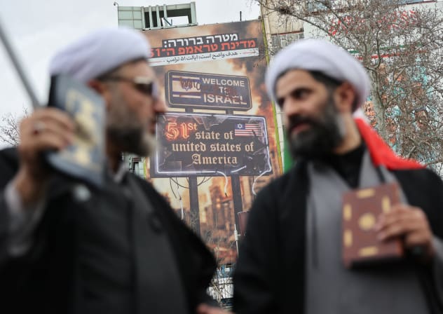 An anti-Israeli and US billboard on a building as Iranian demonstrators protest against the US-Israeli strikes, in Tehran, Iran, February 28, 2026