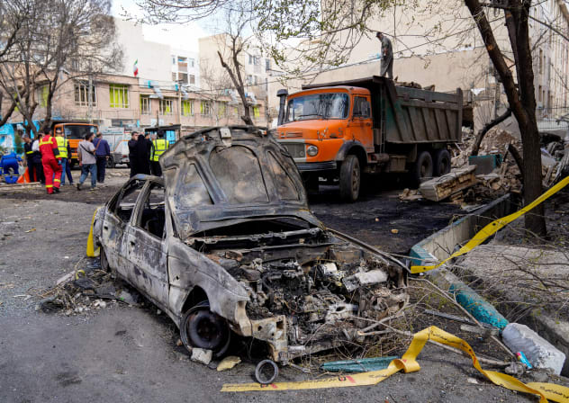 Remains of a car in the aftermath of an Israel and the US strike on a building in Tehran, Iran, February 28, 2026