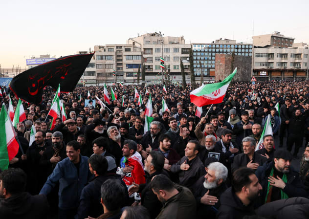 People react as they gather at the Enghelab Square, after Iran's Supreme Leader Ayatollah Ali Khamenei was killed in Israeli and US strikes on Saturday, in Tehran, Iran, March 1, 2026. 