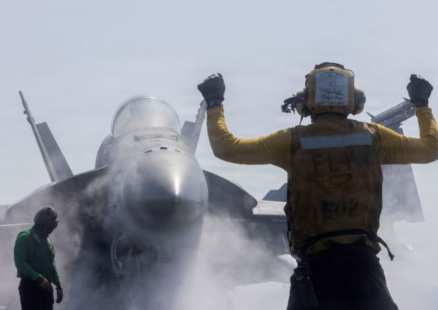 An F/A-18F Super Hornet prepares to launch from the US Navy Nimitz-class aircraft carrier USS Abraham Lincoln in support of the Operation Epic Fury attack on Iran, February 28, 2026.
