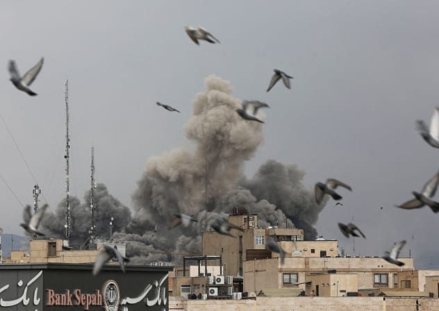 Birds fly as smoke rises following an explosion, after Israel and the US launched strikes on Iran, amid the US-Israel conflict with Iran, in Tehran, Iran, March 2, 2026.