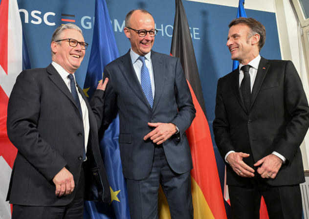 German Chancellor Friedrich Merz, French President Emmanuel Macron and British Prime Minister Keir Starmer pose at the start of the E-3 meeting, during the Munich Security Conference (MSC), in Munich, Germany February 13, 2026.
