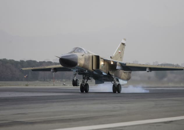 A Sukhoi Su-24M Fencer D aircraft lands on the runway during an Islamic Republic of Iran Air Force military drill at the Shahid Lashkari Tactical Air Base (TAB-1) in Tehran, Iran, on April 16, 2009