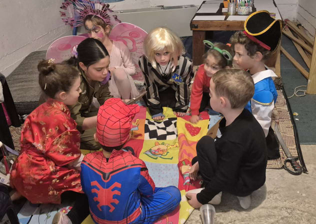 Israeli children celebrate Purim in a bomb shelter, March 2, 2026.