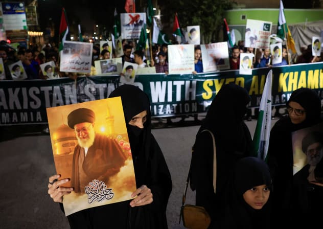 Shiite Muslim supporter of the Imamia Student Organization (ISO) holds a portrait of Iran's Supreme Leader Ayatollah Ali Khamenei during a protest against Israel and the US strikes on Iran, in Karachi, Pakistan February 28, 2026.