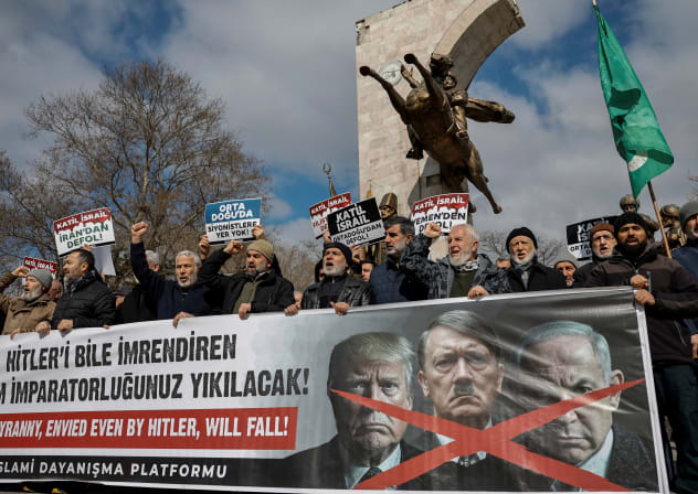 Demonstrators shout slogans as they hold a banner with the images of US President Donald Trump, Israeli Prime Minister Benjamin Netanyahu and Adolf Hitler during a protest after late Iran’s Supreme Leader Ayatollah Ali Khamenei was killed in Israeli and US strikes, in Istanbul, March 1, 2026.